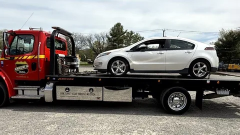 Dave's rollback with a car on the bed in Central NJ