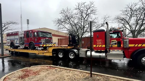 Dave's flatbed carrying a fire truck