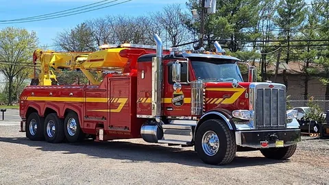 Dave's wrecker and crane on a lift job