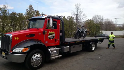 Dave's rollback hauling a motorcycle in Central NJ